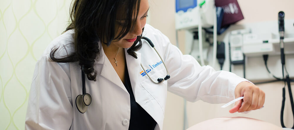 female provider examining patient