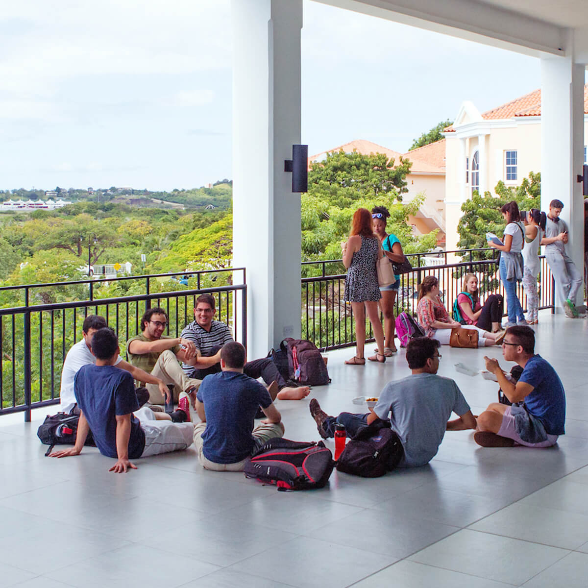These photos are all focused on the alumni, students, and campus life in Grenada.