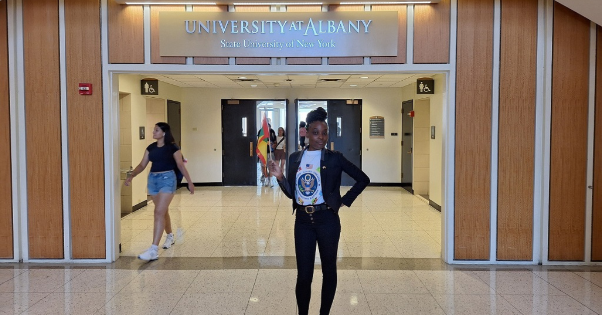 Alanda Joseph standing in front of 