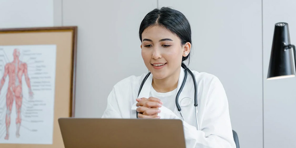 Doctor using Laptop