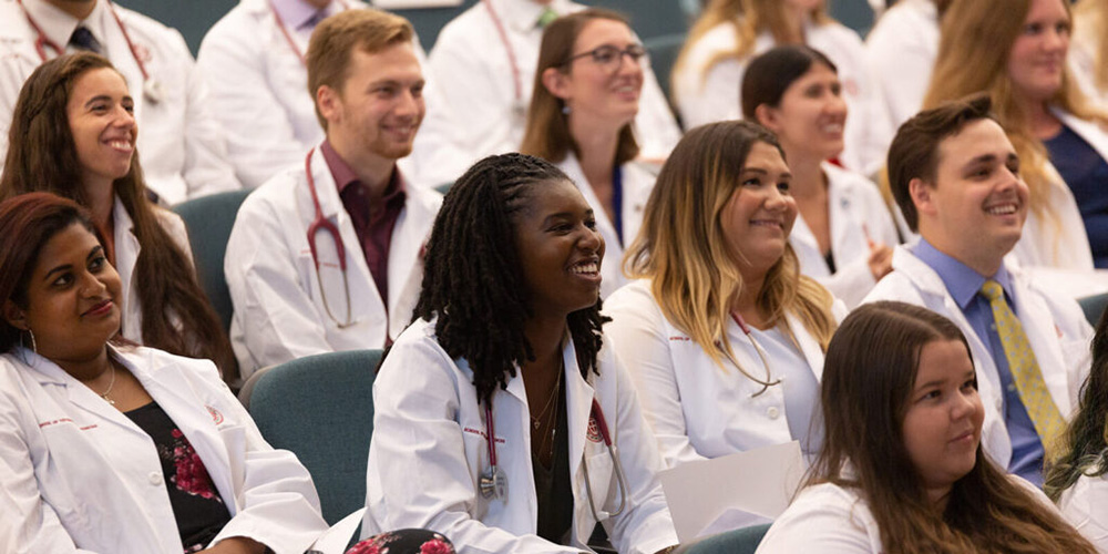 SGU students taking part in a White Coat Ceremony