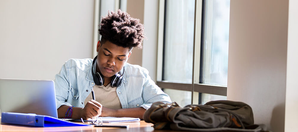College student studying for MCAT