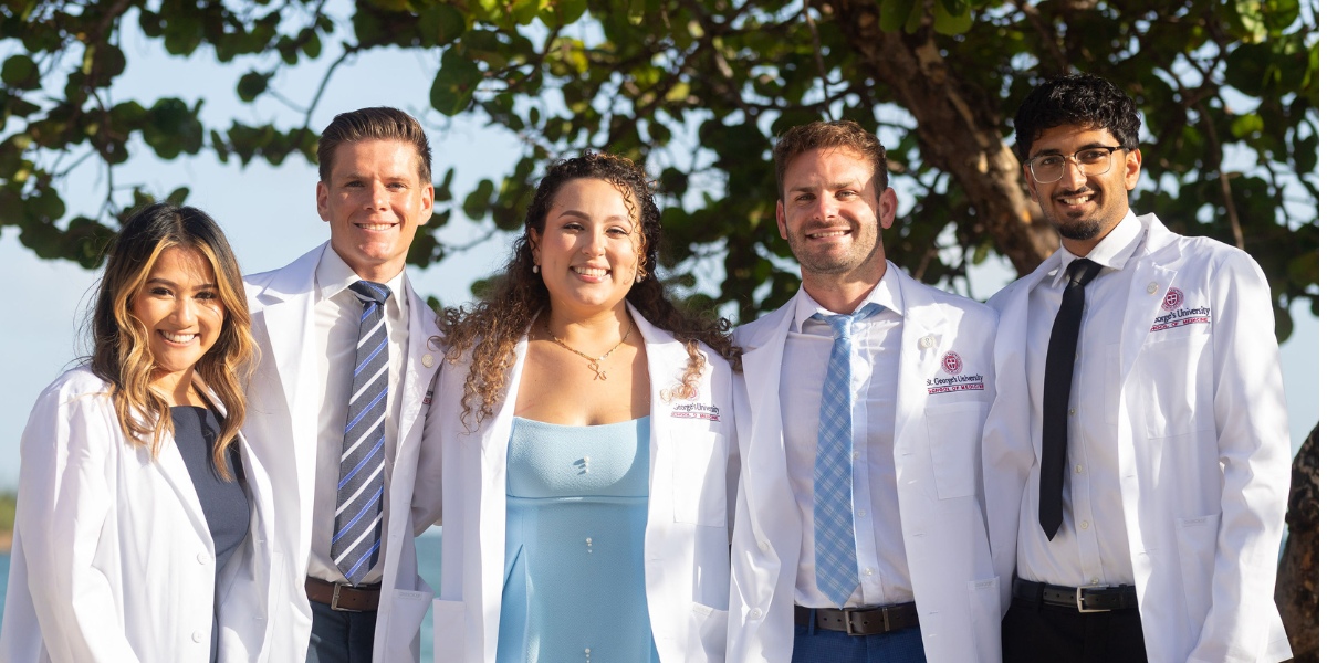 Recently-coated students at the fall 2025 SOM white coat ceremony News