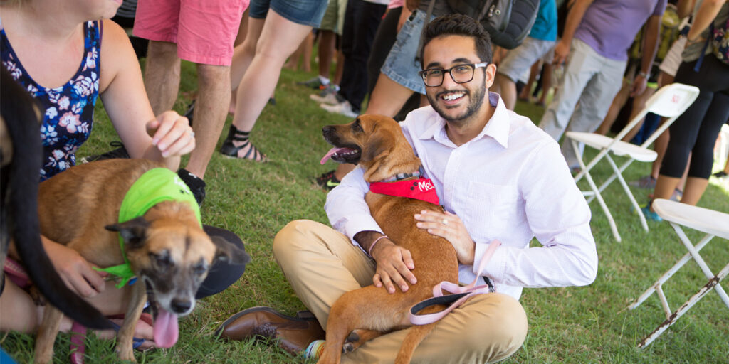 Student with puppy