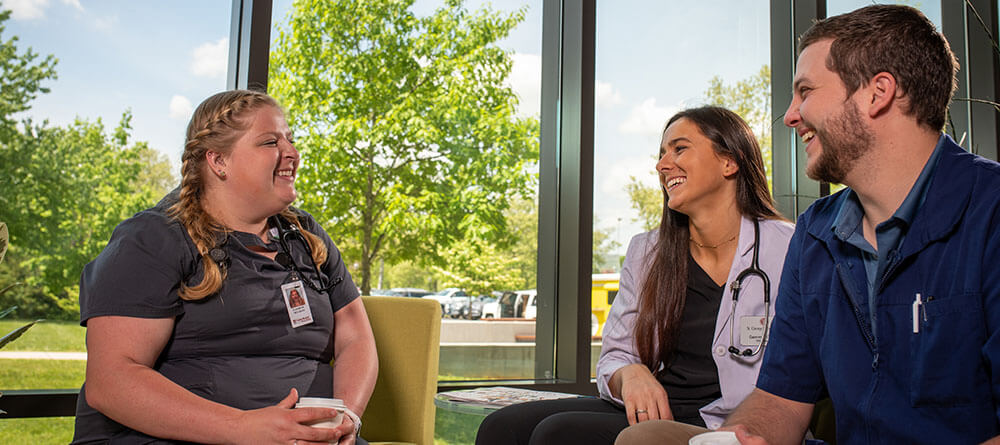 SGU veterinary students chatting on campus